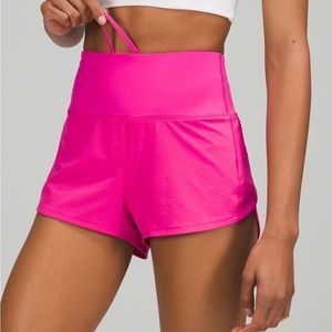 Lululemon speed up short. Inseam is 2.5 in. The color is sonic pink.